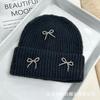 Autumn and winter new Xiaoxiangfeng steel ball bow wool hat versatile women's big head circumference ear protector knitted cold hat