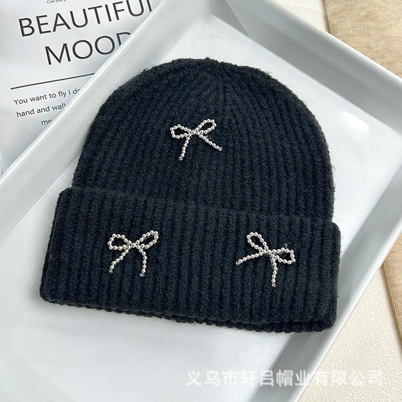 Autumn and winter new Xiaoxiangfeng steel ball bow wool hat versatile women's big head circumference ear protector knitted cold hat