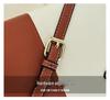 Color Block Kelly Bag: Trendy Two-Tone, Large Capacity, Versatile Shoulder & Crossbody Bag for Work Commute.