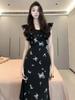 Feeling French: Women's Black Floral Puff Sleeve Dress