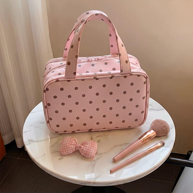 Polka dot handbag, large capacity, layered design, three compartments, can be hung on a suitcase, multiple mesh pockets inside, travel toiletry bag. Pink polka dots
