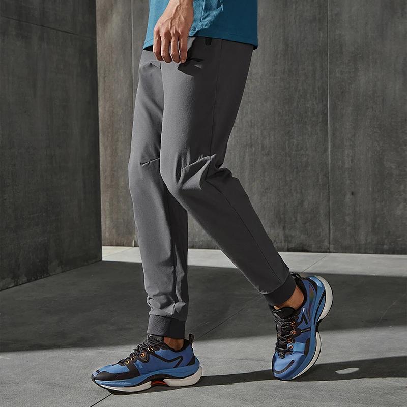 Li Ning Training Series Solid Color Breathable Sweat-Wicking Tapered Knit Sports Pants Men Pants Dark-Black AYKS535-2