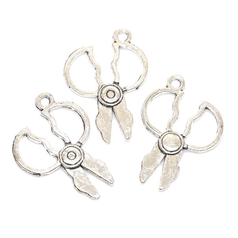 

Набор из 18 подвесок из сплава на швейную тематику: Подвески из игл, ниток, пуговиц и швейной машинки для самодельных украшений