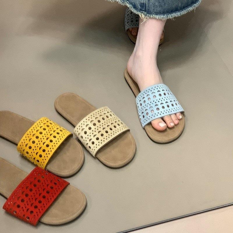 Ethnic style hollow cool slippers women's summer beach slippers 2025 new one-word drag niche