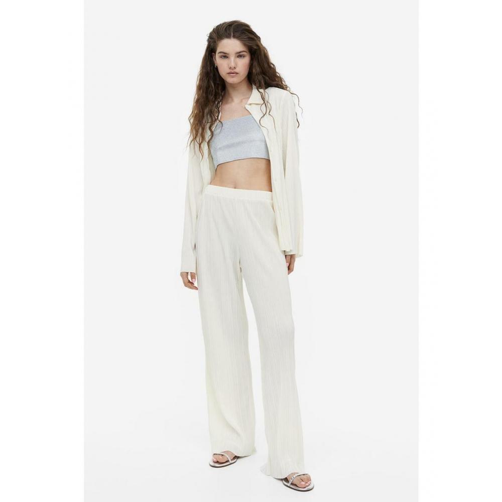 

H&M Брюки из плиссированного джерси кремового цвета 1164824002