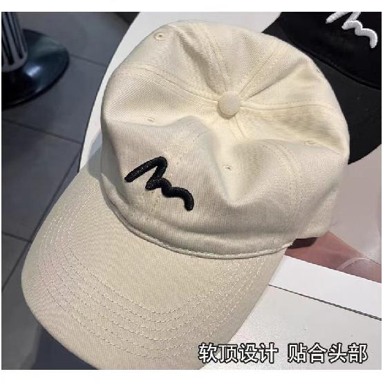 Embroidered baseball cap, lightweight and breathable for outdoor activities, designed to enhance facial features with a simple and stylish look