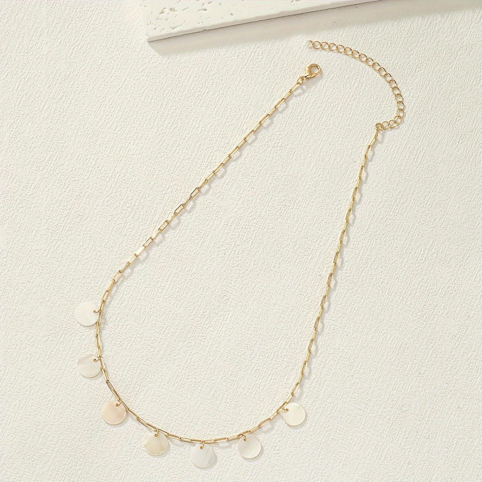 

A fashionable golden yellow neck chain, silver gray disc pendant, women s student temperament fashion necklace.