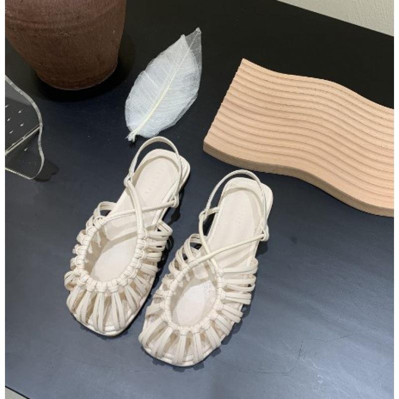 Woven hollow low-heeled bag head Roman sandals 2025 women's summer thick heel with retro brown flat bottom round head