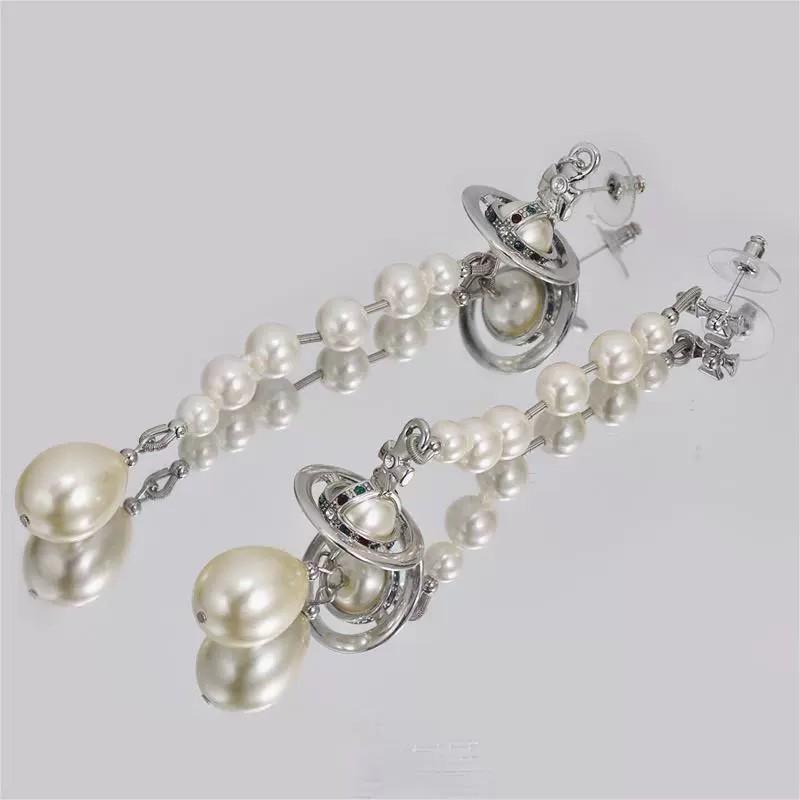 West Pacific Engraved Flying Saucer Asymmetrical Sphere Saturn Tassel Earrings for Women