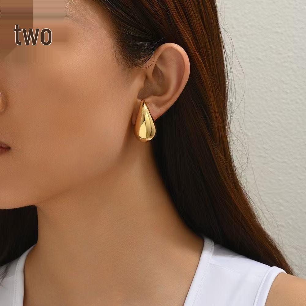 Sleek Teardrop Stud Earrings: Elegant & Versatile Women's Jewelry with a Creative Design.
