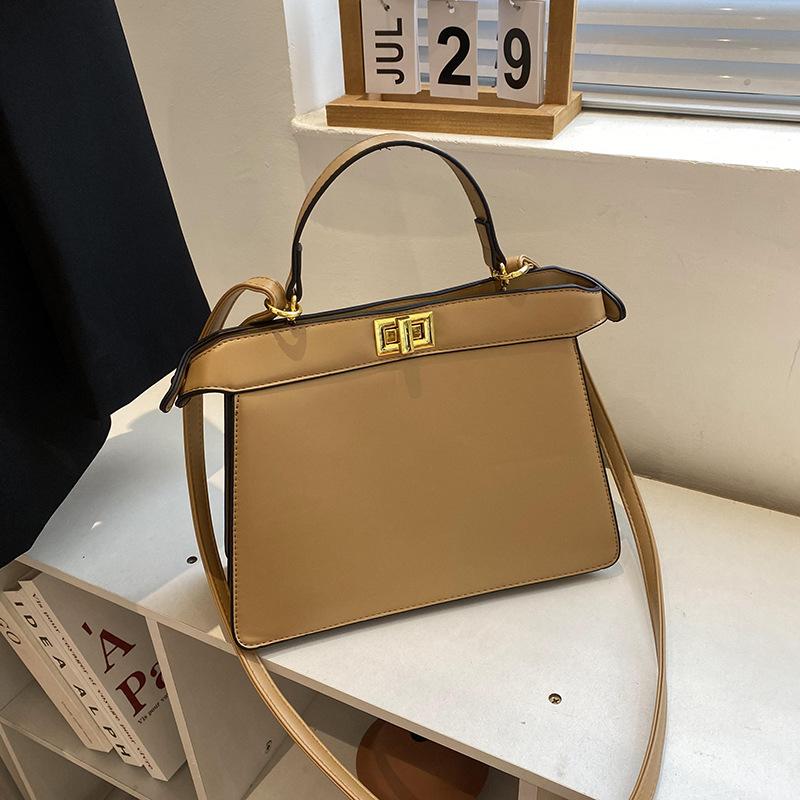 New High-end Solid Color Lock Kaibaoli Portable Shoulder Oblique Span Women's Bag