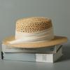 Hollow raffia flat top summer high-end travel seaside sunshade breathable straw hat sunshade French straw hat