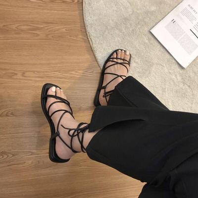 Sandales d'été pour femmes 2024 Nouvelles sandales de plage Mode Sexy Chaussures plates décontractées pour femmes Sandales décontractées à bout ouvert à lacets croisés pour femmes