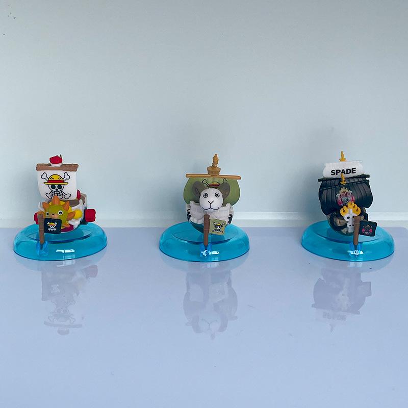 One Piece Anime Model: 8 Styles of Pirate Ships - Going Merry, Thousand Sunny, and Blackbeard's Ship Car Ornament PVC Figure & Bag.