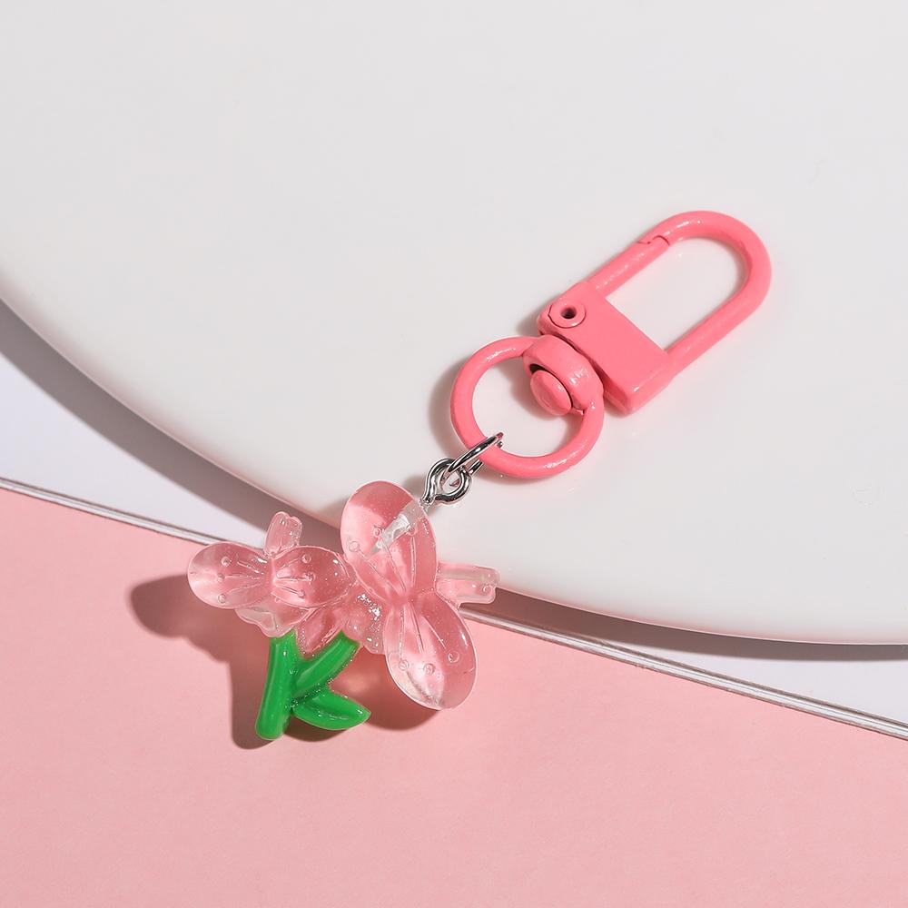 1 Stück Bunter Harz-Tulpen- und Sonnenblumen-Schlüsselanhänger-Anhänger Niedliches Mädchen-Herz Kopfhörer-Taschen-Dekorationen Schlüsselanhänger Schmuckzubehör