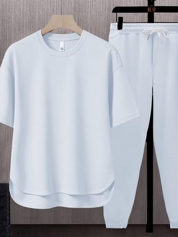 Set da uomo a due pezzi tinta unita tendenza giapponese: T-shirt a maniche corte e pantaloni lunghi (Estate 2025)