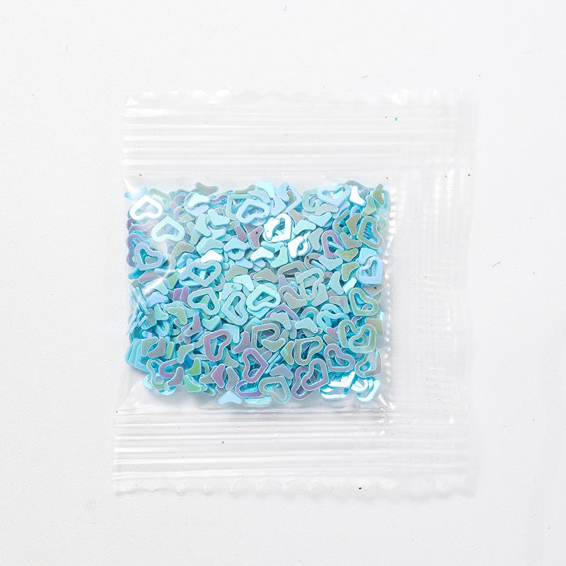 1G Iridescent Hollow Heart Ornament & Slime Mold Filler Glitter