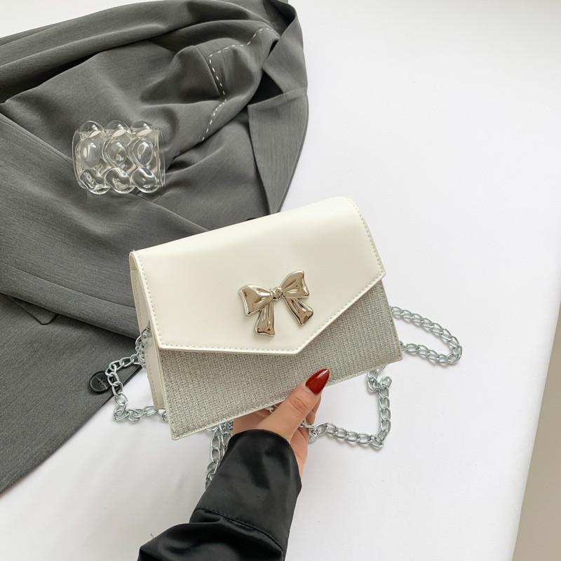 Modische Frühjahrs-Schmetterlingsknoten-Umhängetasche in eleganten Unifarben für einen trendigen Stil