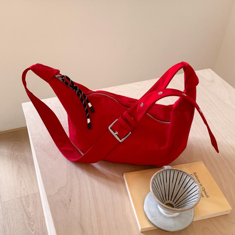 

Dumpling bag summer new Japanese niche Harajuku wind axillary summer bag shoulder bag women s light lazy wind oblique cross tide bag красный