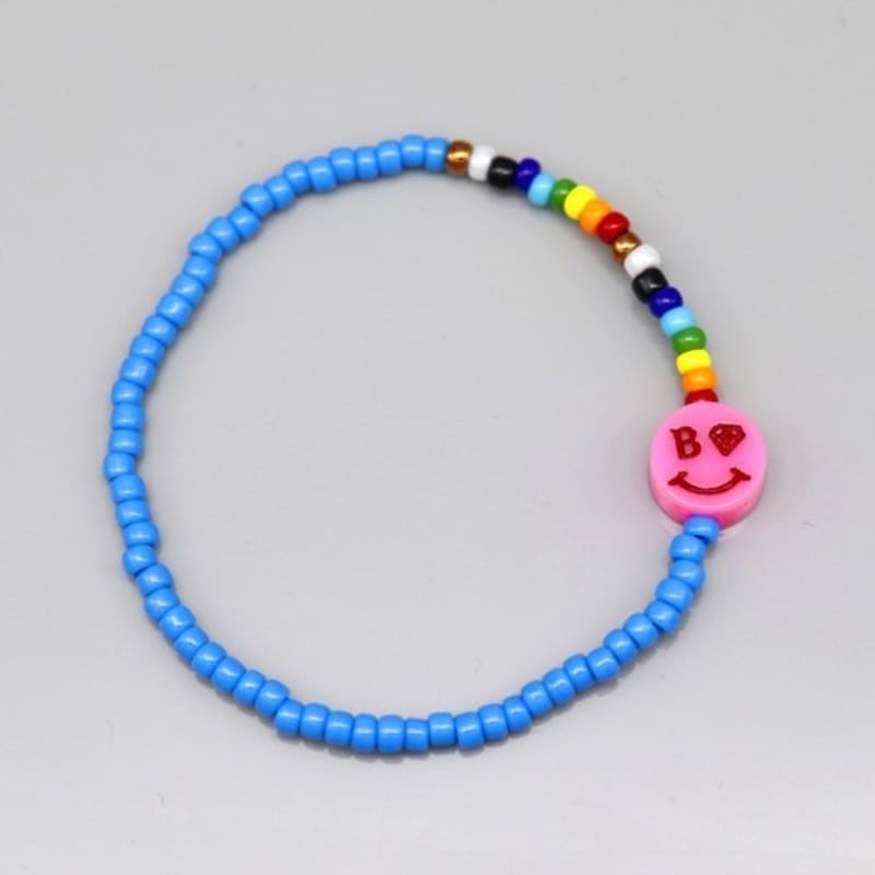 BONBEAU Armband mit Regenbogenperlen und Smiley-Anhänger, 5 Farben