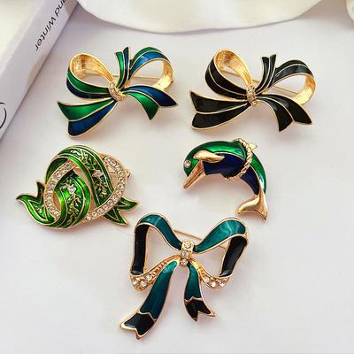 Medieval Court Temperament Bow Dolphin Enamel Brooch Retro Anti-Light Corsage