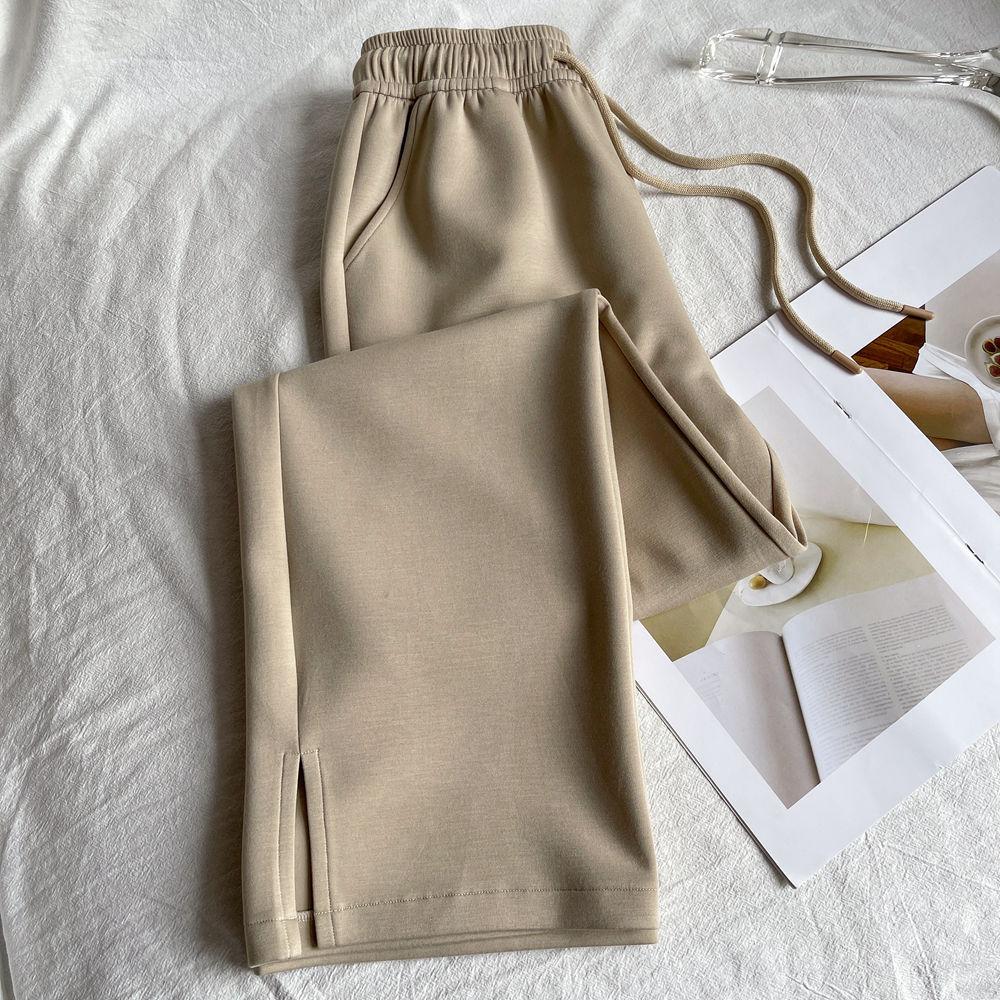 

Весняно-літні жіночі брюки з драпірованими повсякденними брюками з боковим розрізом. Штани. Вільні тонкі вузькі широкі брюки. 2XL хакі