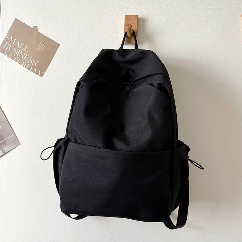 Schoolbag new versatile solid color large-capacity backpack women's schoolbag male college student junior high school student casual computer bag