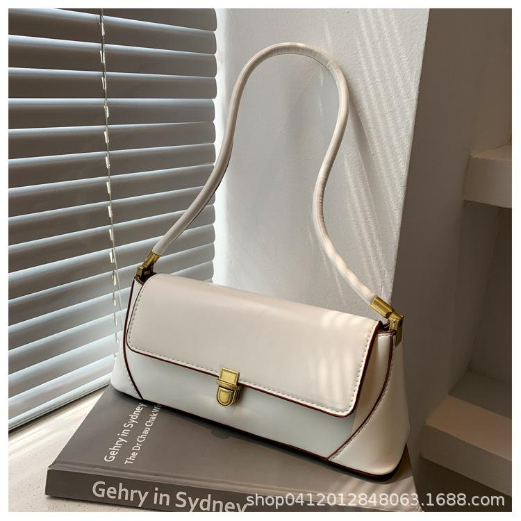 

Французская нишевая сумка под мышкой, ретро сумка-багет, модная универсальная сумка через плечо, женская новая трендовая портативная женская сумка 2025 года бежевый