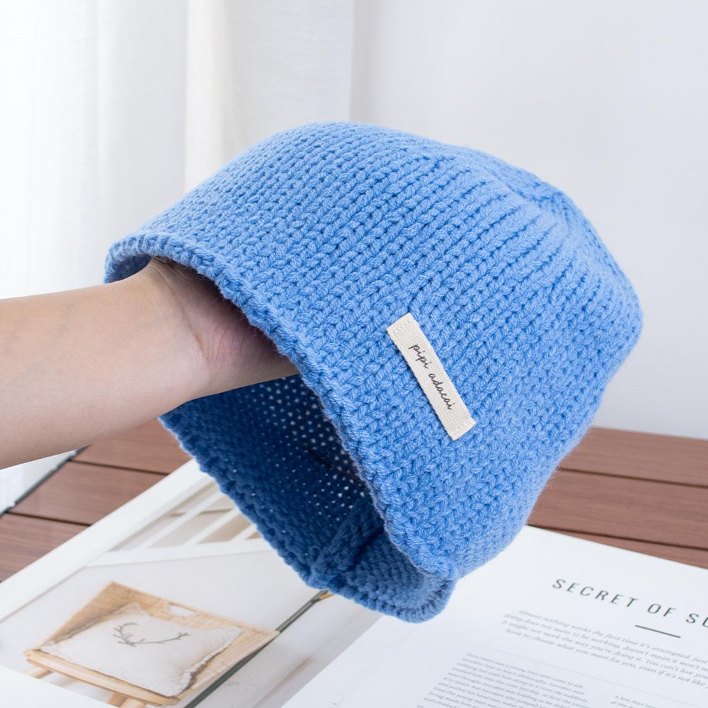 Simple solid color knitted bag head stacking hat women's early autumn new plain and versatile big head circumference showing face small wool hat