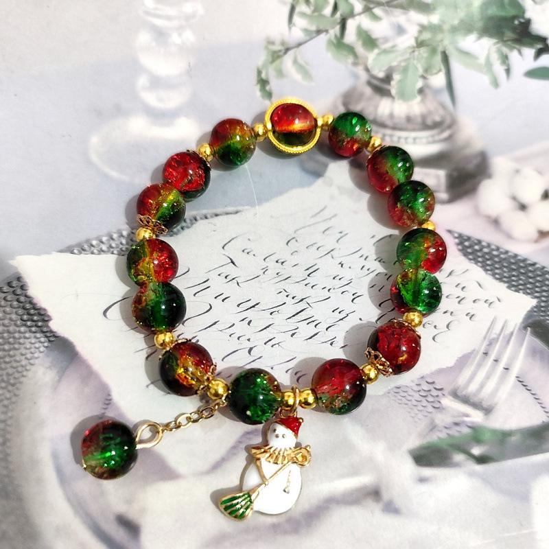 

Christmas Charm Bracelet with Crackle Beads, Snowflake, Tree, Santa, & Bell Pendants