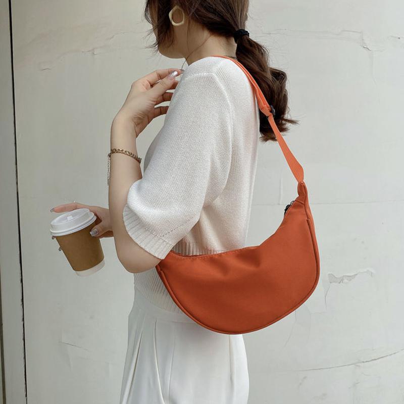 half moon shaped purse