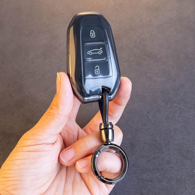 

Universal Peugeot Key Cover for Models 408, 508L, E2008, 5008, 408X, and DS9D Transparent Black Single Cover
