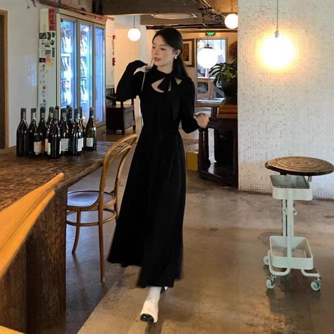 French new early spring lace-up temperament black skirt foreign style long dress good-looking and thin long-sleeved dress