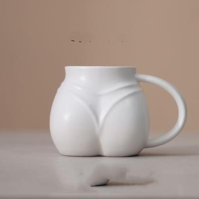 Tasse à café en forme de fesses de bikini amusante Tasse en céramique créative Corps féminin sexy Fesses avec T-back Tasse 330ML