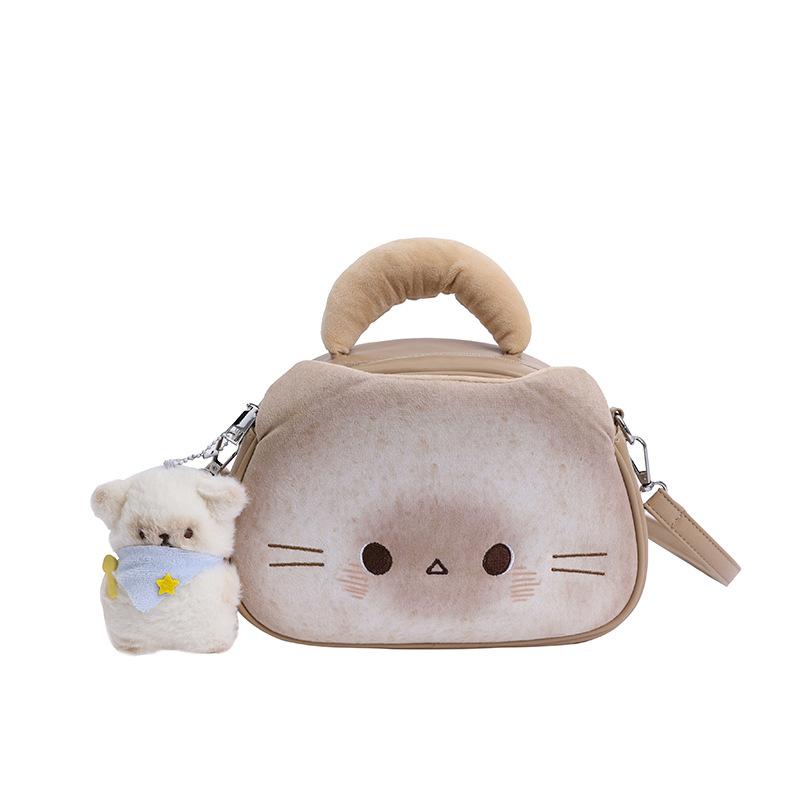 

Internet celebrity cute biscuits kitten bag 2025 new Japanese cartoon girl foreign versatile messenger small round bag tide