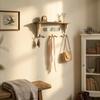 Charming wooden aged white coat rack with three hooks and a mirror