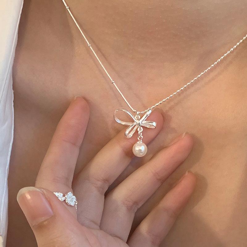 Korean Style Retro Pearl Necklace: Women's Multi-Layer Asymmetrical Clavicle Chain with OT Buckle
