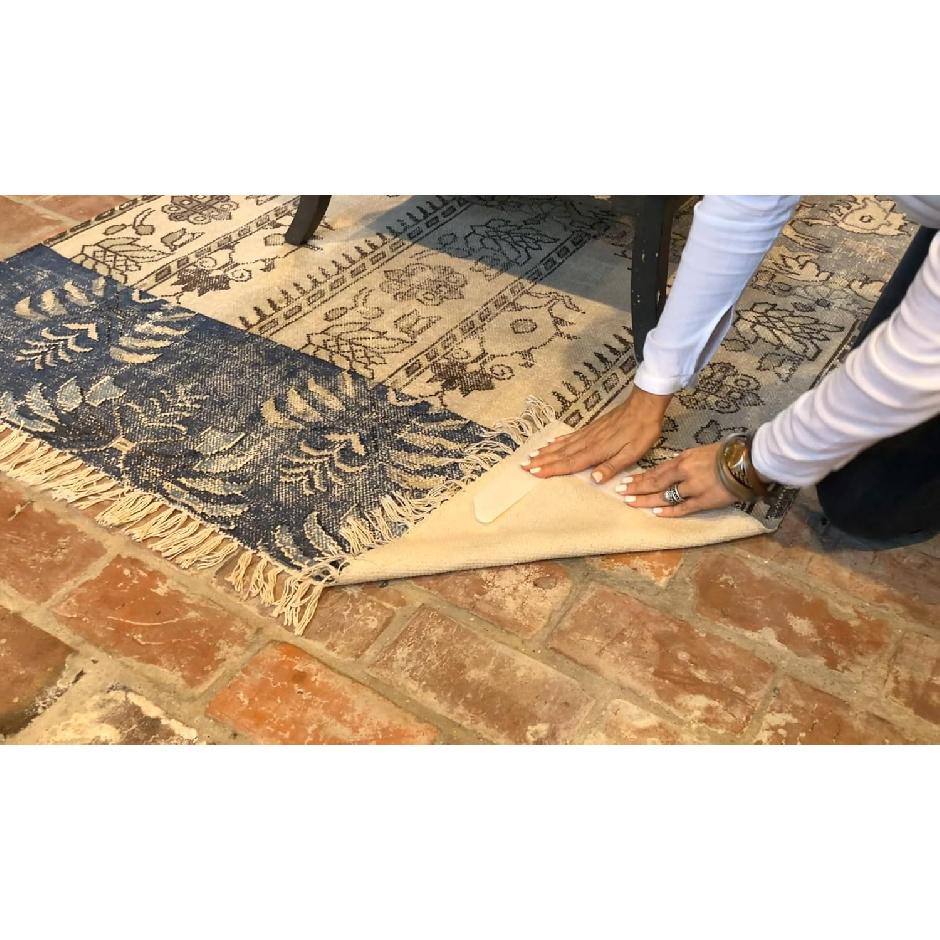 The Original Curl Stop Rug Gripper Prevents Curling on Rug and Carpet Corners.