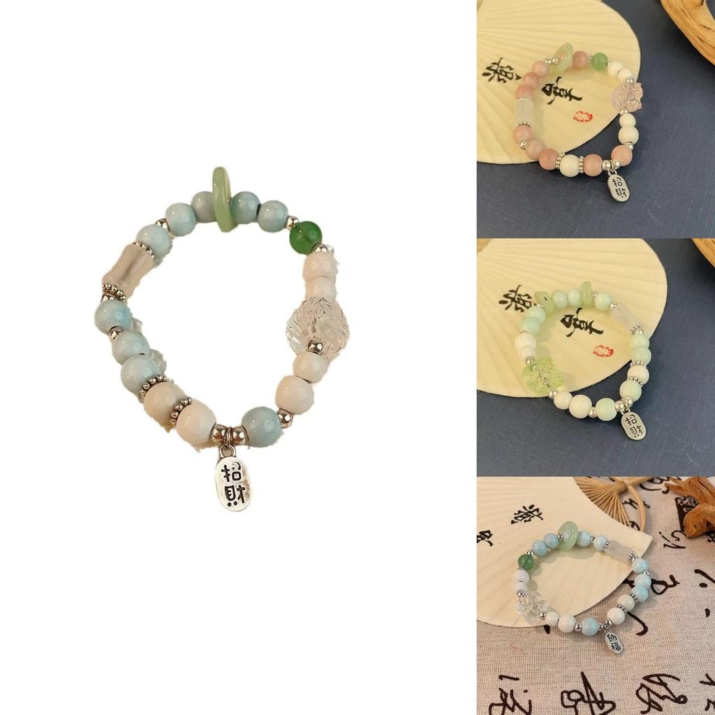 Modern Chinese Pink Ceramic Bead Bracelet With Lion Head For Travel Souvenirs