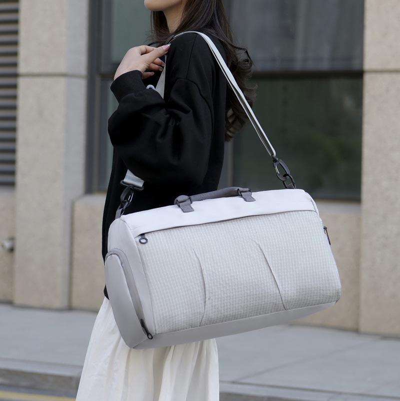 Unisex Large Capacity Travel Tote: Handheld or Shoulder Gym Bag with Wet/Dry Separation, Shoe Compartment, and Outdoor Sports Storage.