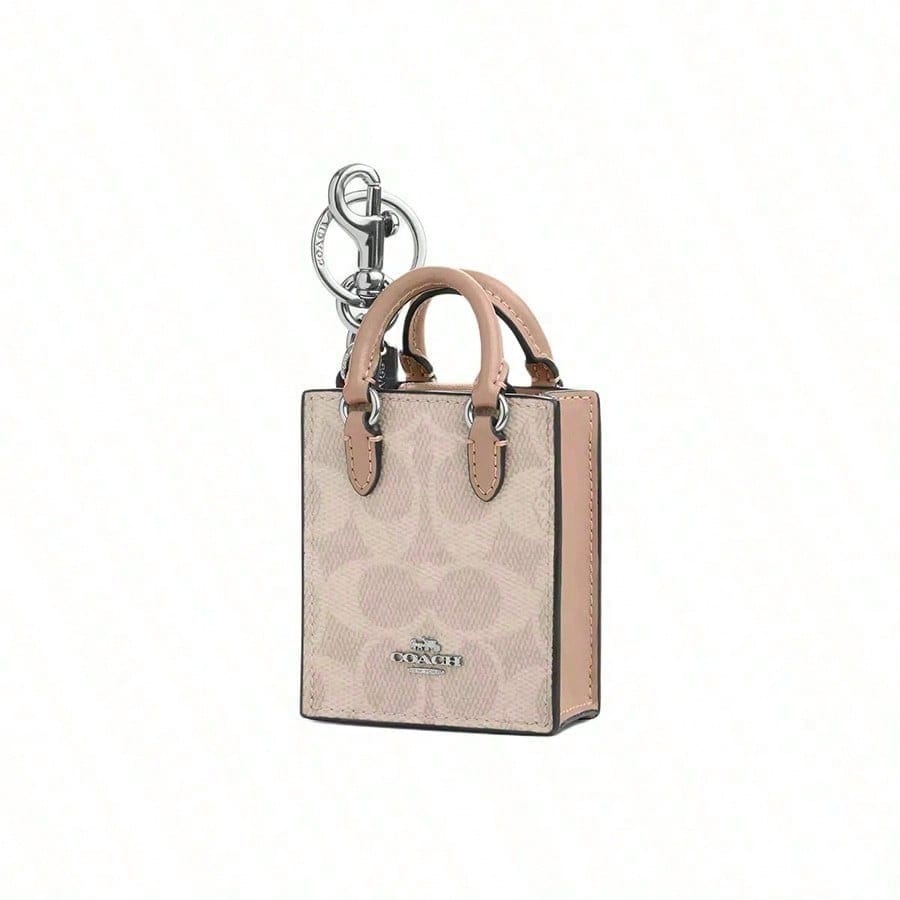 COACH NorthSouth 8 Brand Metal Logo Magnetic Buckle Coated Canvas Earphone Case Mini Women s Beige CX069-SVPWH белый 9880₽