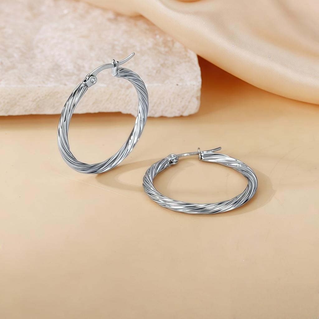2025 Elegant Titanium Steel Needle-Woven Hoop Earrings - High-End, Colorfast Design for Women