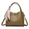 This Bucket Bag Is A Simple and Fashionable Urban Design with A Lychee Pattern and A Silk Scarf. It Is A Hand-held Shoulder Bag