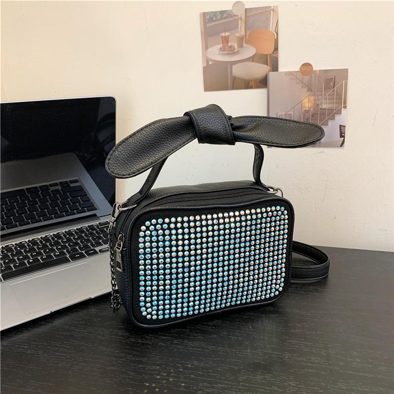 

Internet celebrity fashion temperament knotted handbag 2024 early autumn new foreign style shoulder messenger bag leisure bag small square bag різнокольоровий