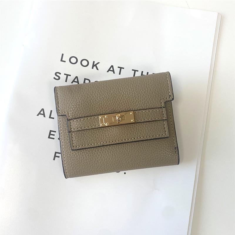 

Європейський та американський жіночий висококласний трискладений гаманець - Стильний короткий клатч