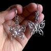 Modern Steel Hollow Heart Shaped Hoop Earrings With Electroplated Finish For Girls