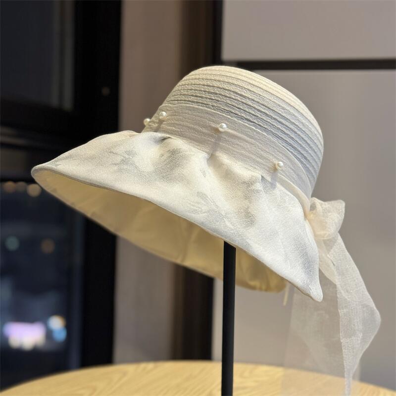 

New French-style Hepburn-inspired pearl fisherman hat for women, with fairy-like charm, bow tie, and ribbon, suitable for sun protection and casual Adult54-60Adjustable бежевый
