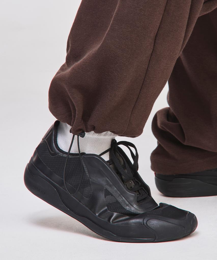 SIGNATURE Curved Training Pants [Brown]