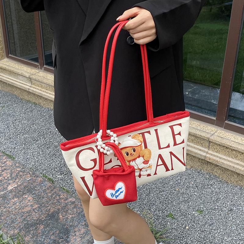 Large capacity bear letter tote bag women's new niche canvas bag versatile commuter tutoring bag