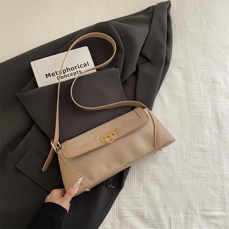

Autumn and winter new solid color lock women s retro simple design portable baguette shoulder bag